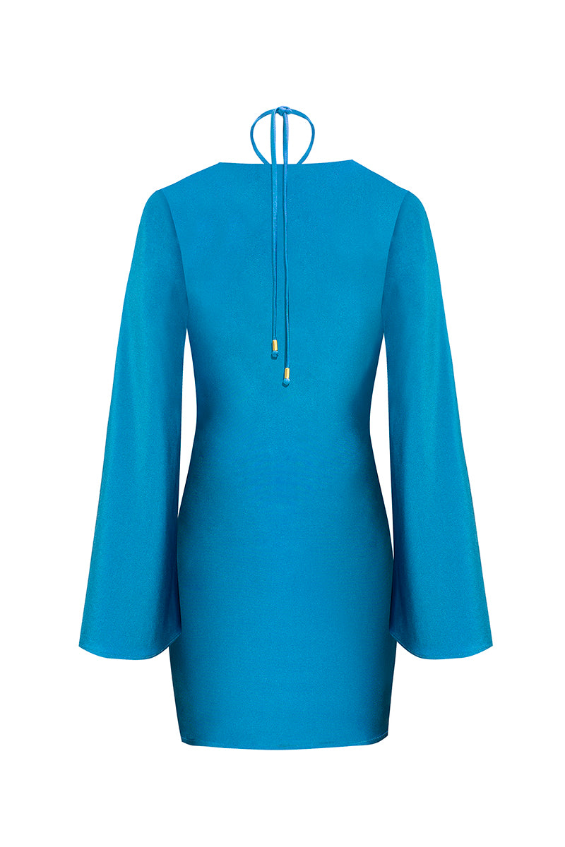 Teal Andrea maxi dress by Laura Escobar displayed on a hanger with flowing fabric and elegant design details.