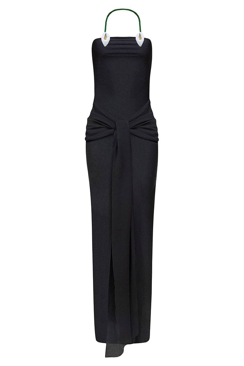 Black Paula maxi dress by Laura Escobar, flowing fabric and elegant design, shown on a model.