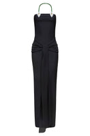 Black Paula maxi dress by Laura Escobar, flowing fabric and elegant design, perfect for casual or formal occasions.
