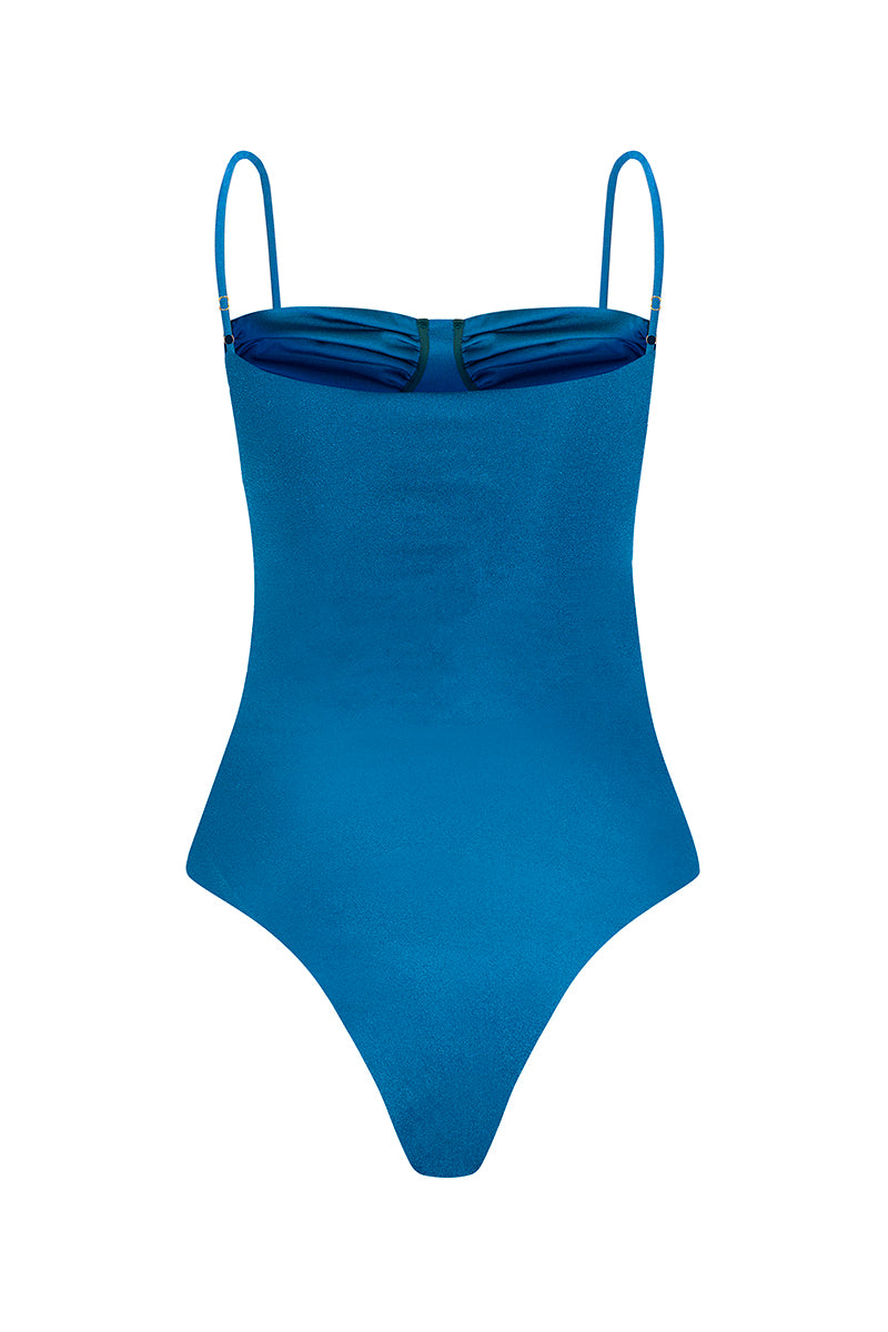 Ocean blue Laura Escobar Tenerife one-piece swimsuit displayed on a mannequin, featuring a stylish and fitted design.