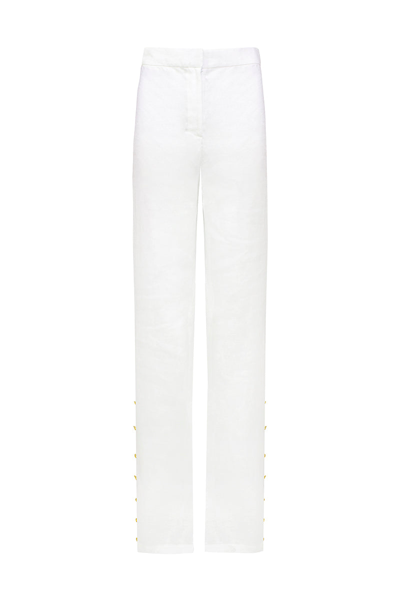 White Laura Escobar Lina pants, tailored women's pants with a sleek fit, shown in a stylish studio setting.