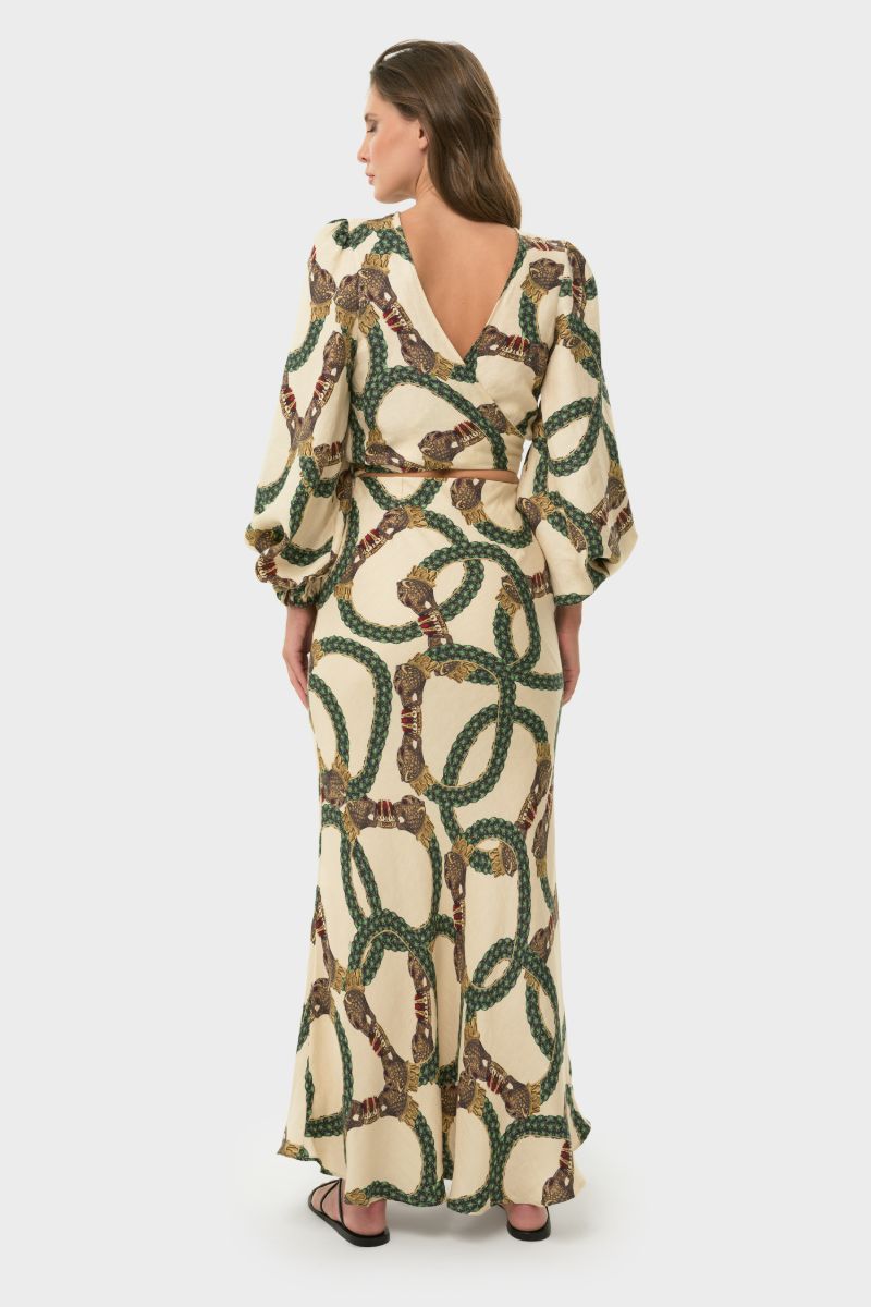niLuu Maia wrap top in Celine fabric, showcasing a stylish, fitted design with a wrap front and elegant long sleeves.