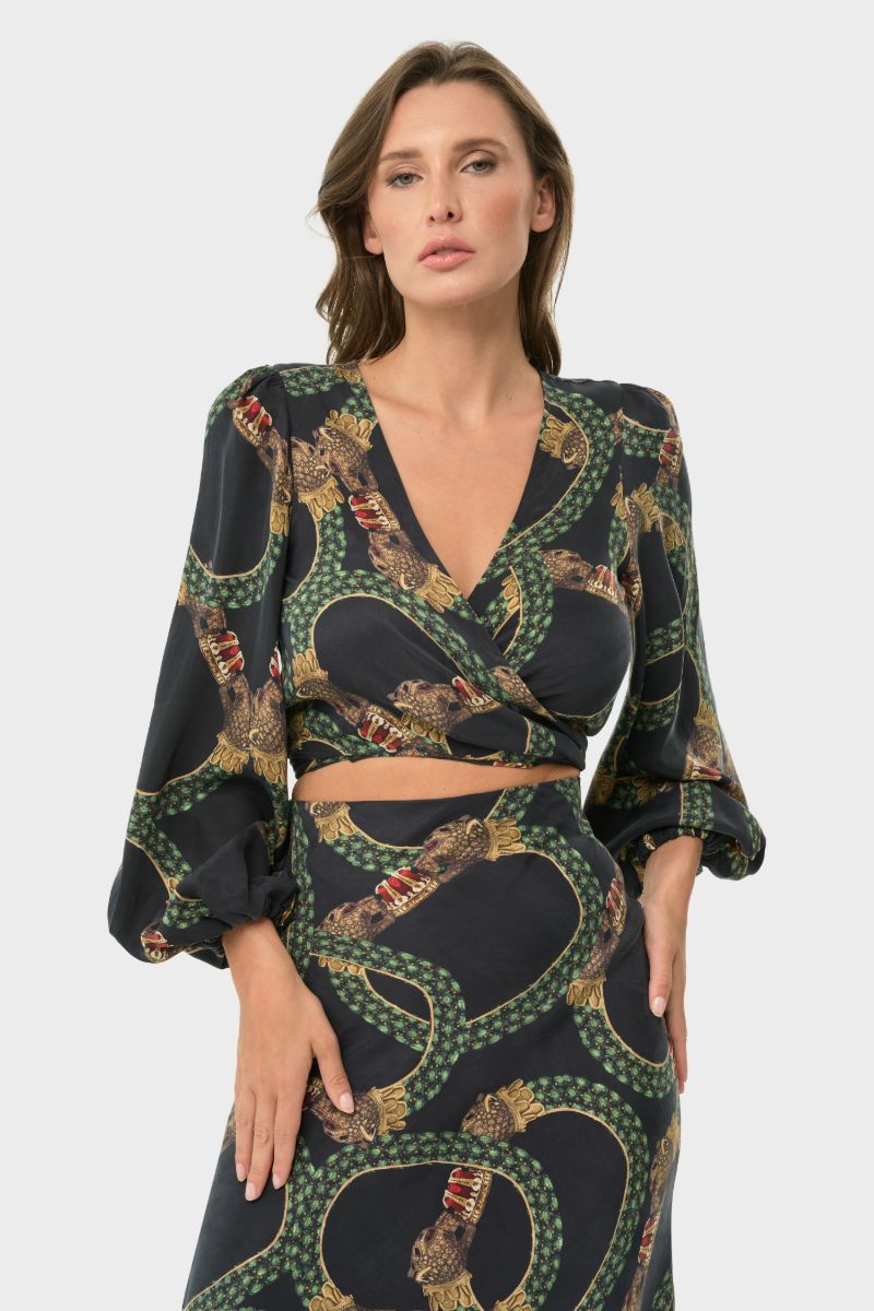 NiLuu Maia wrap top in Dion with long sleeves and V-neck, shown on a model, stylish and versatile women's fashion top.