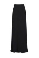 Black Tinta Latina Miel maxi skirt with flowing fabric and waist tie, styled as a versatile women's fashion piece.