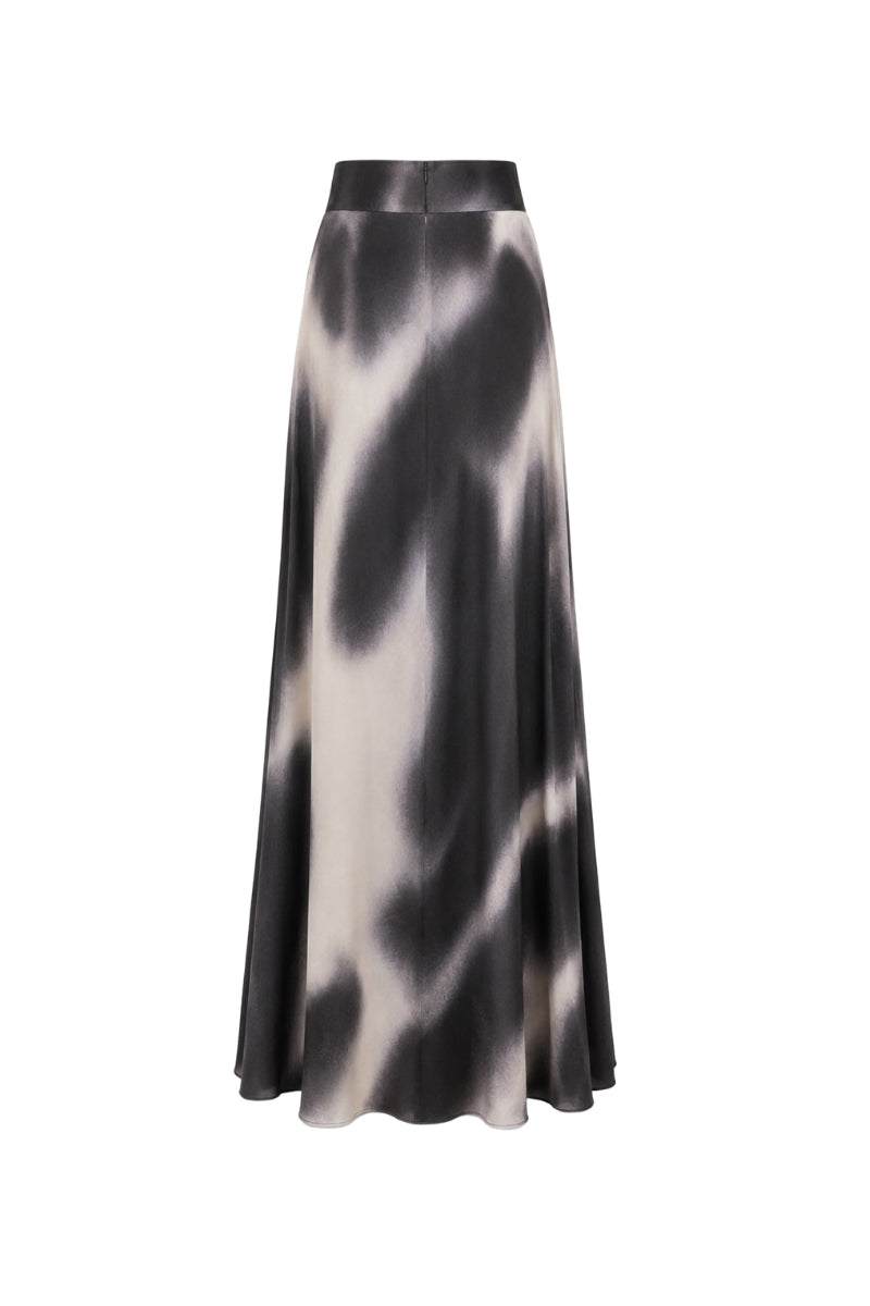 Black print MIEL maxi skirt by Tinta Latina, flowing fabric with stylish design, perfect for casual or dressy occasions.