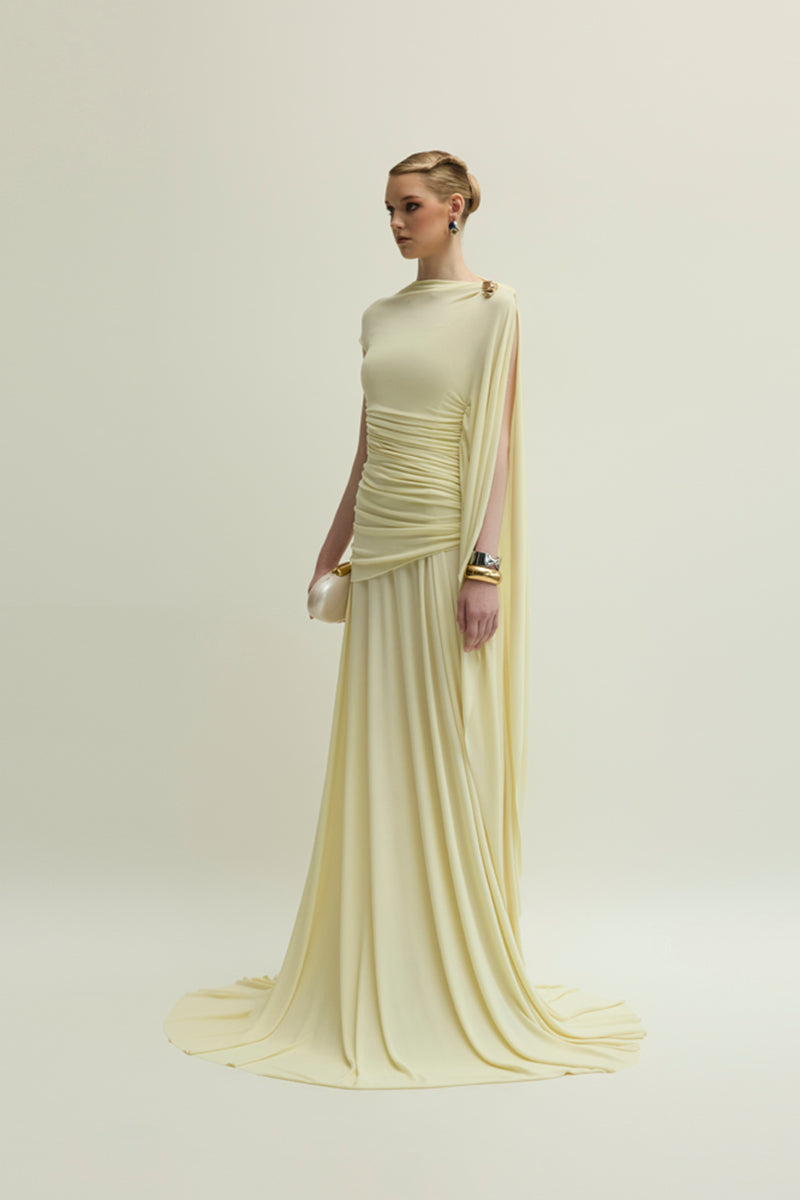 Yellow Minerva gown by Jenny K Tran featuring elegant fabric and flowing design, perfect for formal occasions.