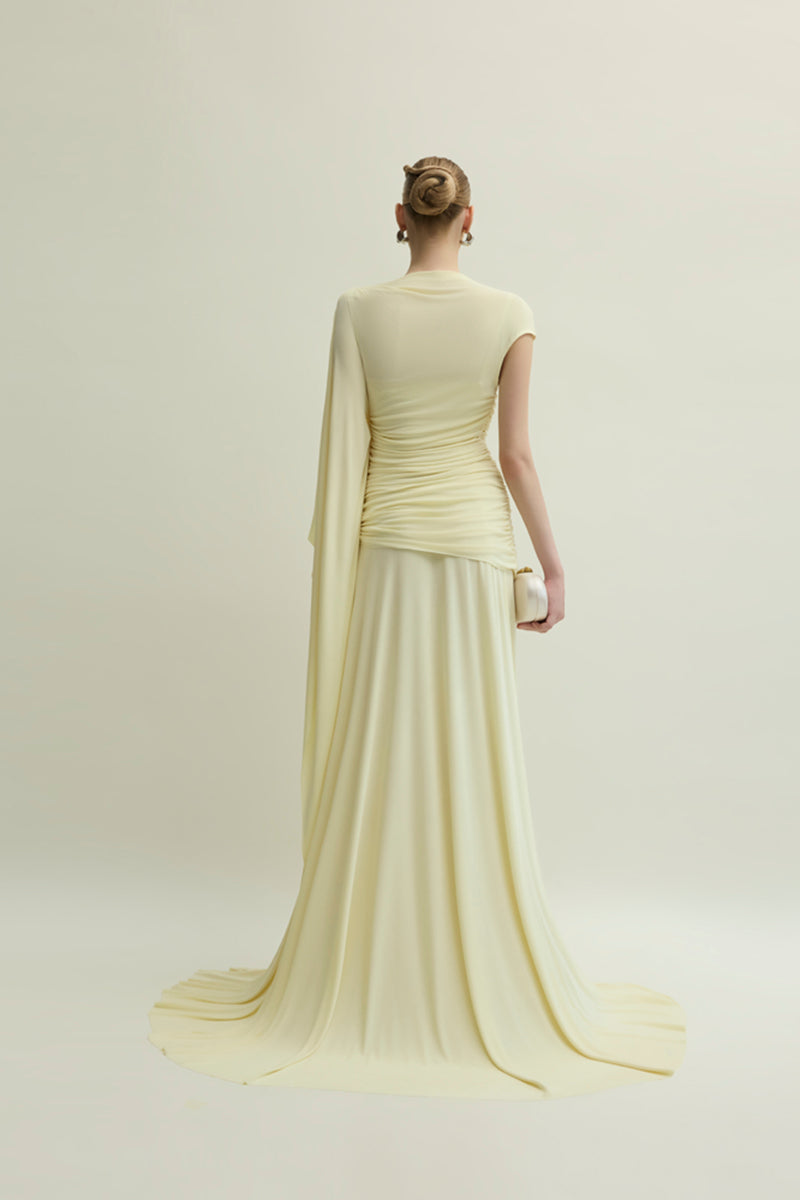 Yellow Minerva gown by Jenny K Tran displayed on a model, showcasing elegant fabric and stylish design.