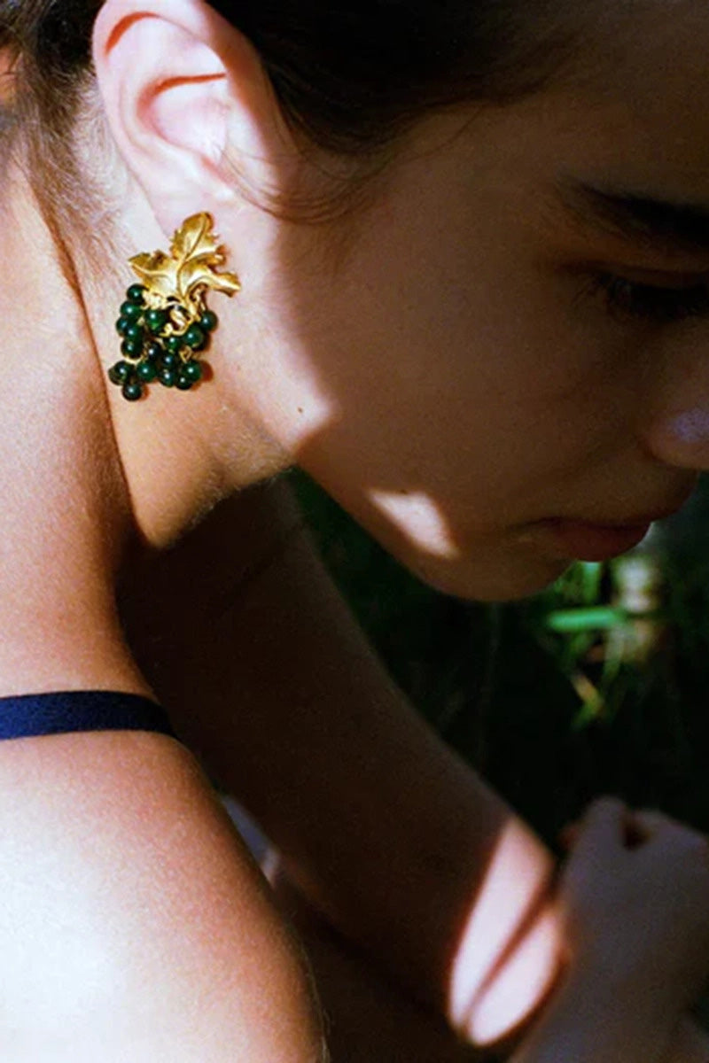 Peracas mini Adile earrings in vibrant emerald green, featuring small, elegant hoop design with a shiny finish.