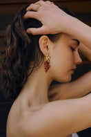 Red Mini Adile earrings by PERACAS featuring small, stylish hoop design with a shiny finish.