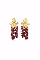Red MINI Adile earrings by PERACAS featuring small, stylish hoop design for a subtle, elegant look.