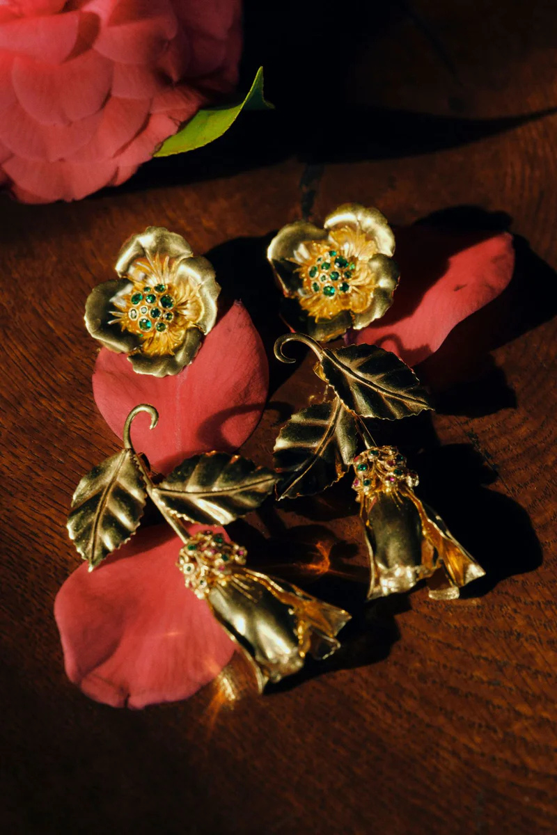 Mini Boboli earrings in vibrant emerald green by Peracas, featuring a delicate hoop design with a polished finish.