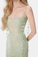 Mint beaded lace pencil gown by Montsand featuring intricate lace details and a fitted silhouette.