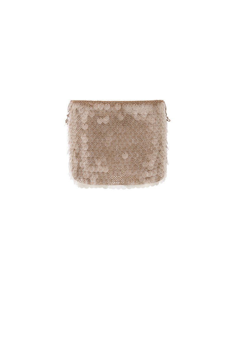 Hand-crochet mocha mini skirt with sequin embellishments by Mirel Prentice, shown on a model.