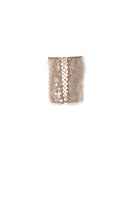 Hand-crocheted mocha mini skirt with sequin embellishments from Mirel Prentice, showcasing intricate texture and shimmering details.