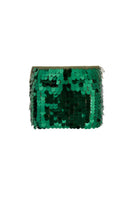 Emerald green hand-crochet mini skirt with sequin embellishments by Mirel Prentice, showcasing intricate detailing and vibrant color.