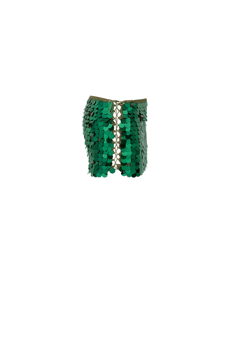 Emerald green hand-crochet mini skirt with sequin embellishments by Mirel Prentice, shown on a model.