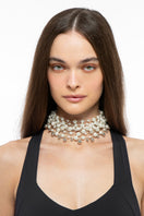 Silver and pearl necklace by Silvia Gnecchi featuring elegant silver chain and pearl accents in a stylish design.