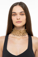 Silver and gold necklaces from the MIRU IN collection by Silvia Gnecchi, featuring elegant layered chain designs.
