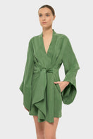niLuu AQUAFLORA AMARA mini kimono robe in moss, soft fabric with floral pattern, displayed hanging on a hanger.