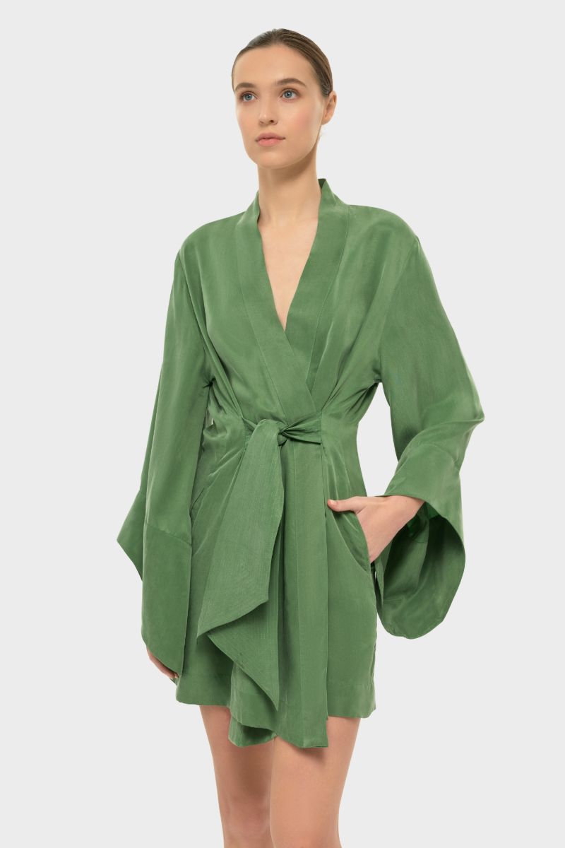 niLuu AQUAFLORA AMARA mini kimono robe in moss, soft fabric with floral pattern, displayed hanging on a hanger.