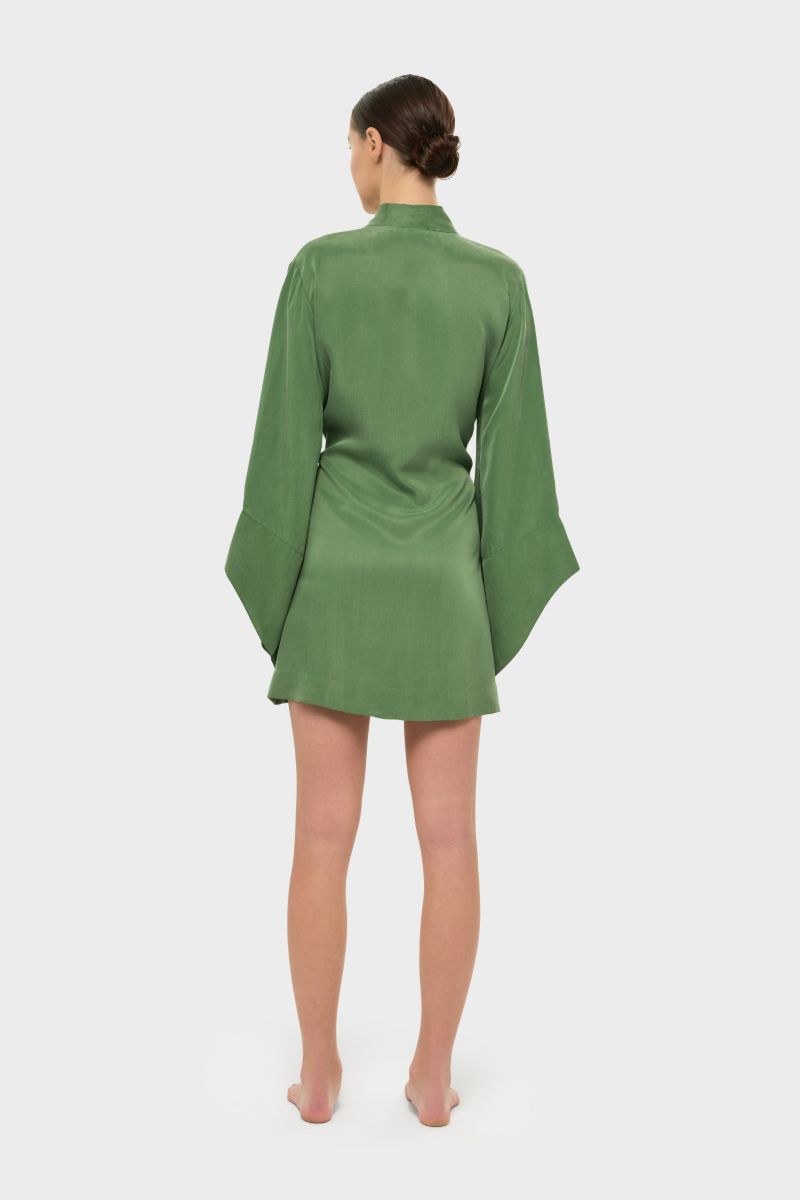 niLuu AquaFlora Amara mini kimono robe in moss, soft fabric with wide sleeves and floral pattern, displayed hanging against a neutral background.