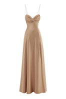 Monetre CULT MIA X MONETRE LUEUR gown featuring elegant fabric and intricate design, showcased in this stylish full-length image.