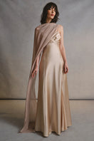 Monetre Cult Mia X Monetre Lueur gown displayed on a mannequin, featuring elegant design and luxurious fabric.