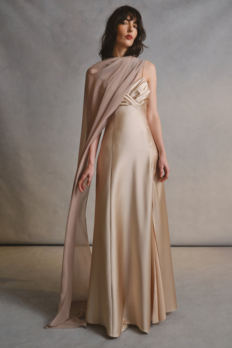 Monetre Cult Mia X Monetre Lueur gown displayed on a mannequin, featuring elegant design and luxurious fabric.