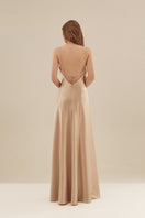 Monetre CULT MIA X Monetre Lueur gown in soft fabric, featuring elegant design and detailed craftsmanship.