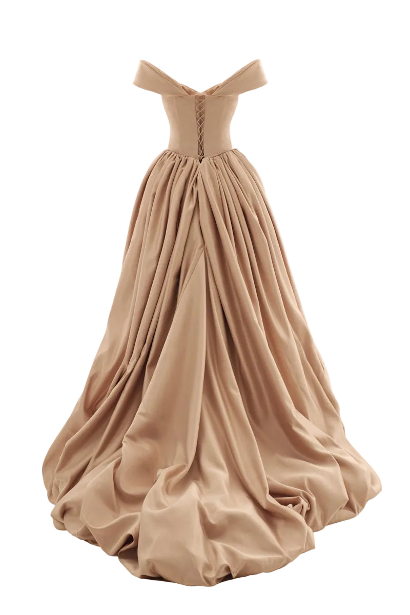 Elegant CULT MIA X MONETRE Aura gown displayed on a model, showcasing intricate design and flowing fabric.