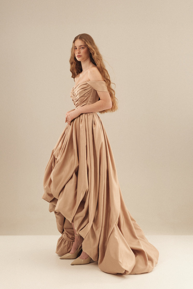 Elegant CULT MIA X MONETRE Aura gown with intricate detailing and flowing fabric, perfect for formal occasions.