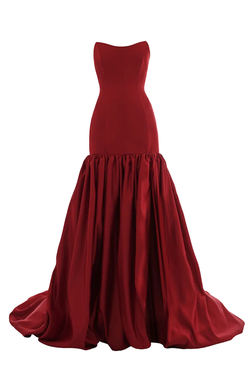 Elegant black gown by Monetre from the CULT MIA X MONETRE collection, featuring flowing fabric and stylish design.