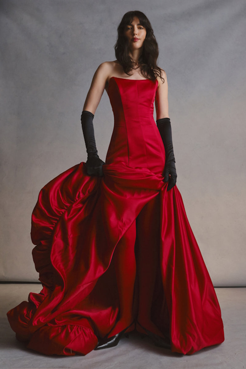 Monetre Cult Mia X Monetré Noir gown featuring elegant black fabric and flowing design, perfect for formal occasions.