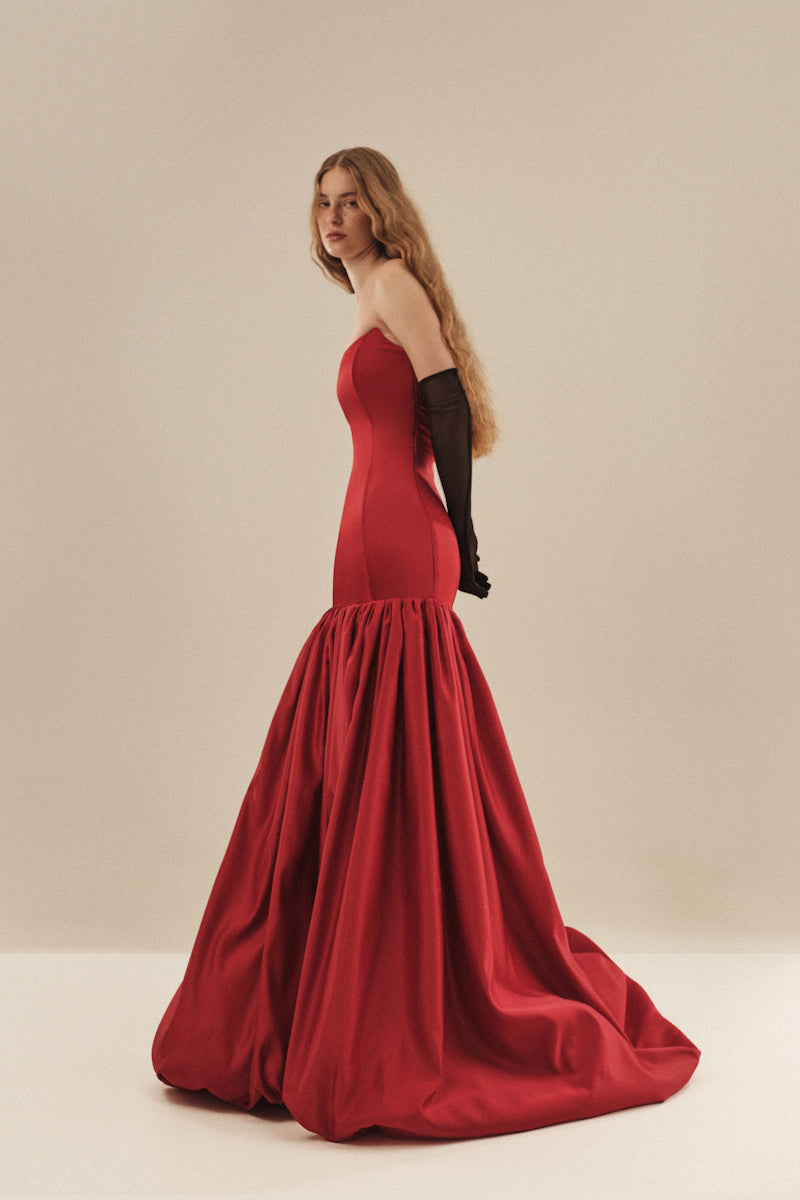 Elegant black gown from Cult Mia X Monetre, featuring a flowing design and intricate details, perfect for formal occasions.