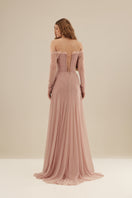 Elegant CULT MIA X MONETRE Céline gown featuring flowing fabric and intricate detailing, perfect for formal occasions.