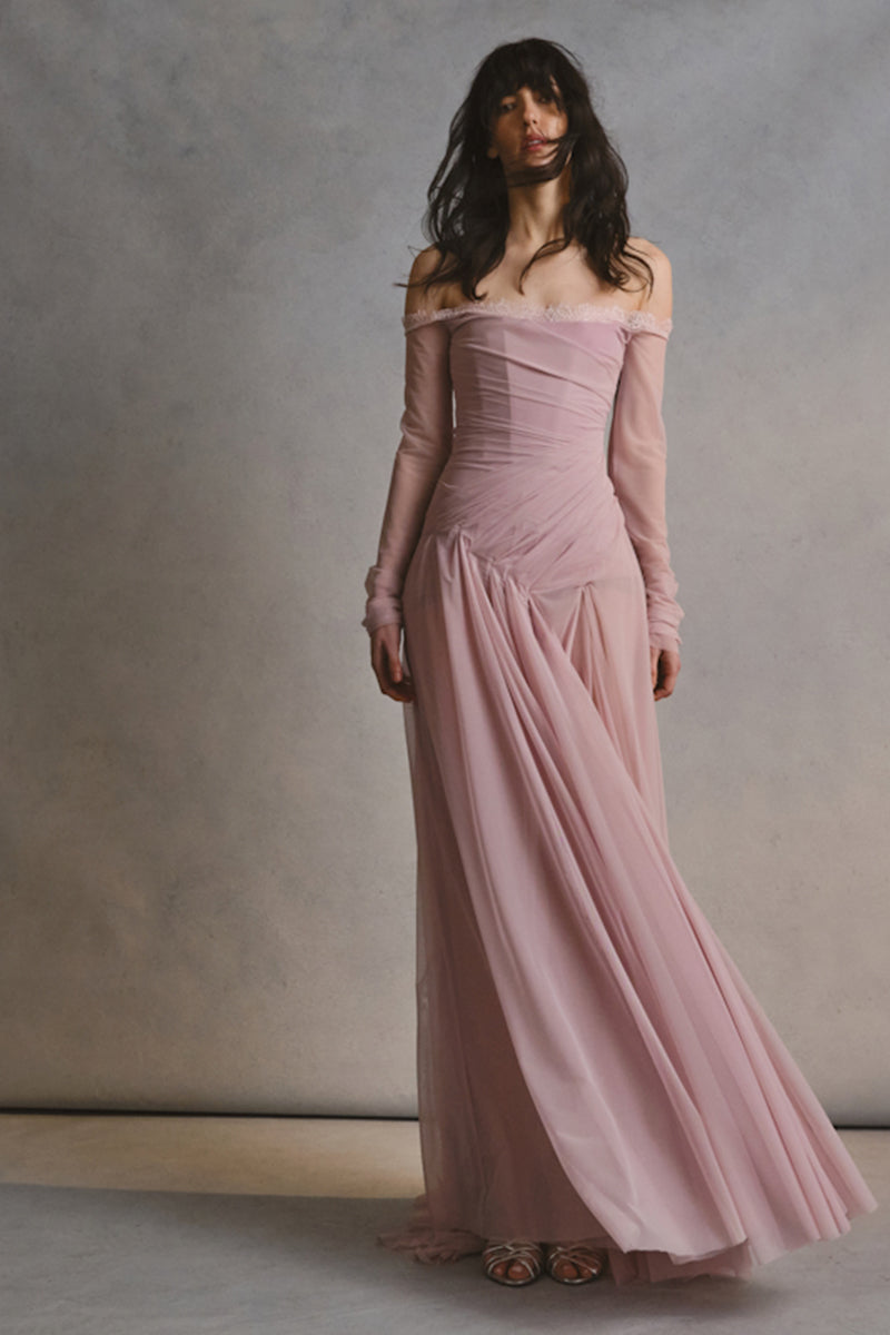Monetre CULT MIA X Monetré Celine gown displayed on a hanger, featuring elegant fabric and detailed design.