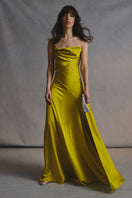 Monetre Cult Mia X Monettre Viride gown displayed on a mannequin, showcasing elegant fabric and detailed design.