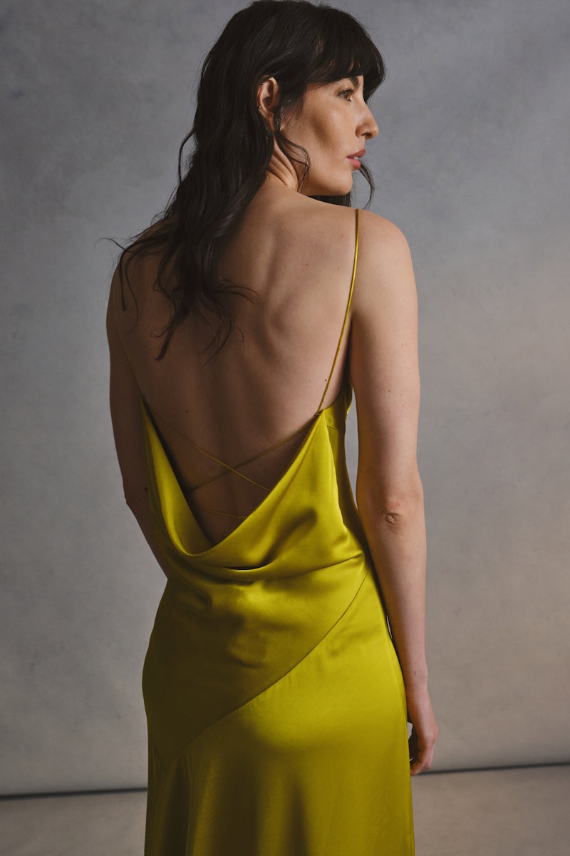Monetre CULT MIA X MONETRE VIRIDE gown with intricate floral embroidery and flowing fabric, elegant and stylish for special occasions.