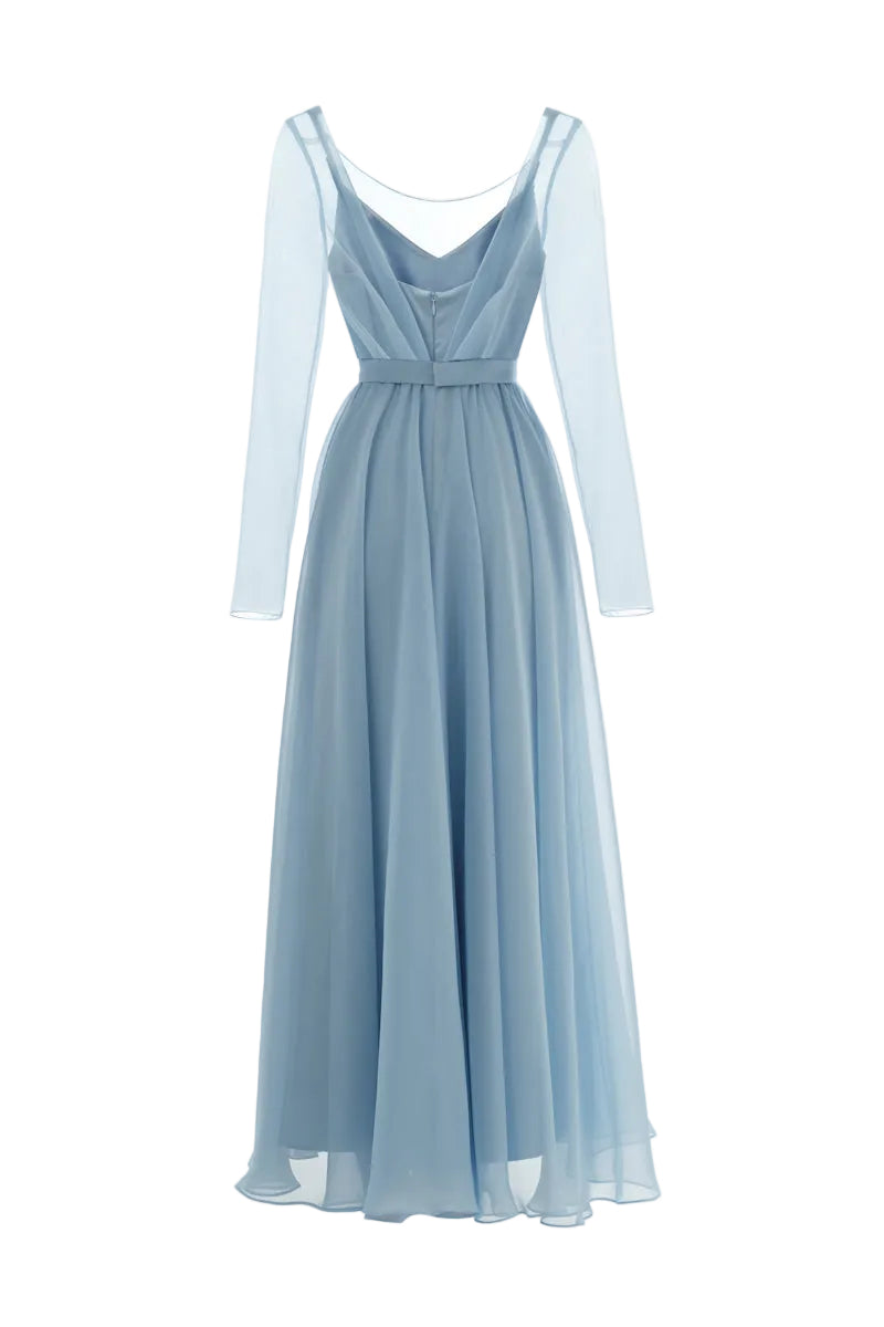 Monetre CULT MIA X MONETRE ÉTHER maxi dress in flowing fabric, showcasing its elegant design and vibrant pattern.