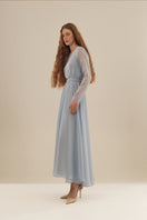 Elegant CULT MIA X MONETRE ÉTHER maxi dress in flowing fabric with intricate detailing, perfect for stylish occasions.