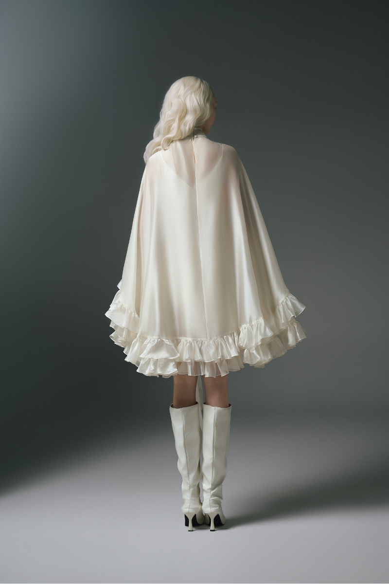 White Plan Monarch mini dress featuring a stylish design, perfect for casual or special occasions.