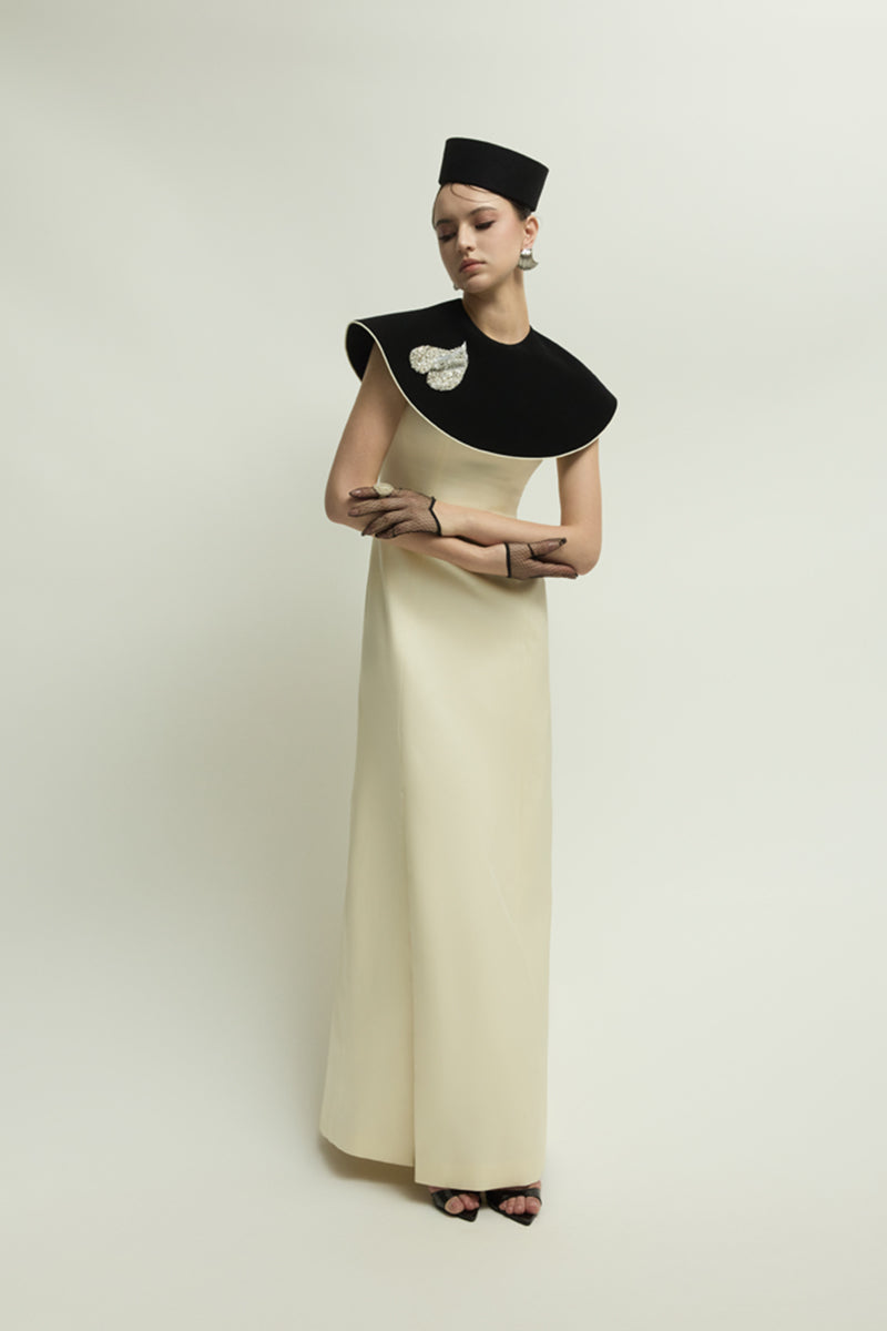 Black and ivory Montpellier gown by Jenny K Tran, elegant evening dress with flowing fabric and intricate design details.