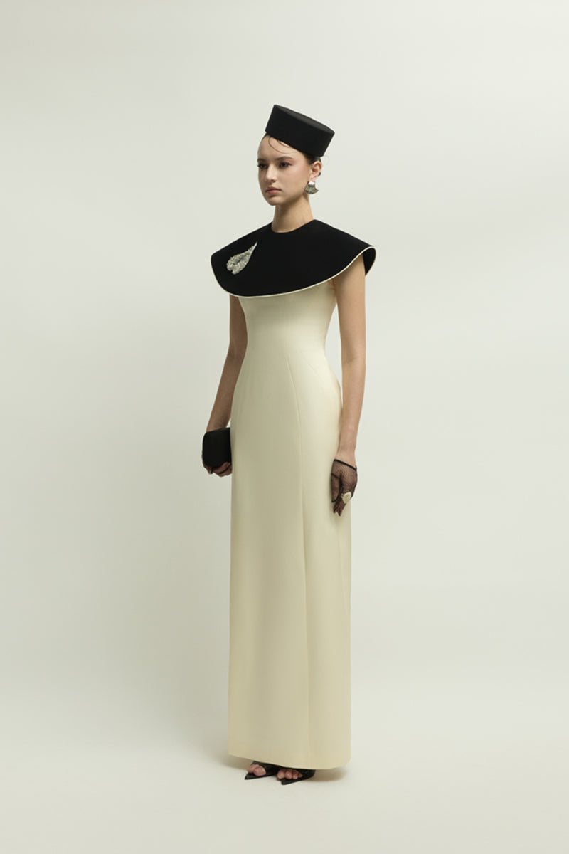Elegant black and ivory Montpellier gown by Jenny K Tran, showcasing a flowing design with intricate details.
