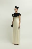 Elegant black and ivory Montpellier gown by Jenny K Tran, showcasing a flowing design with intricate details.