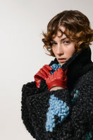 Lalo black wool coat with a classic design, featuring a tailored fit and button closure, perfect for stylish winter wear.