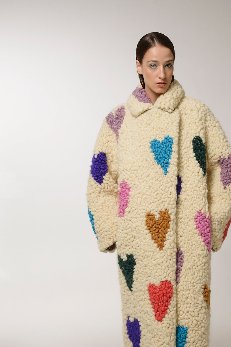 Lalo Cream Hearts wool coat featuring a soft, cozy fabric with a heart pattern, stylish and perfect for cold weather.