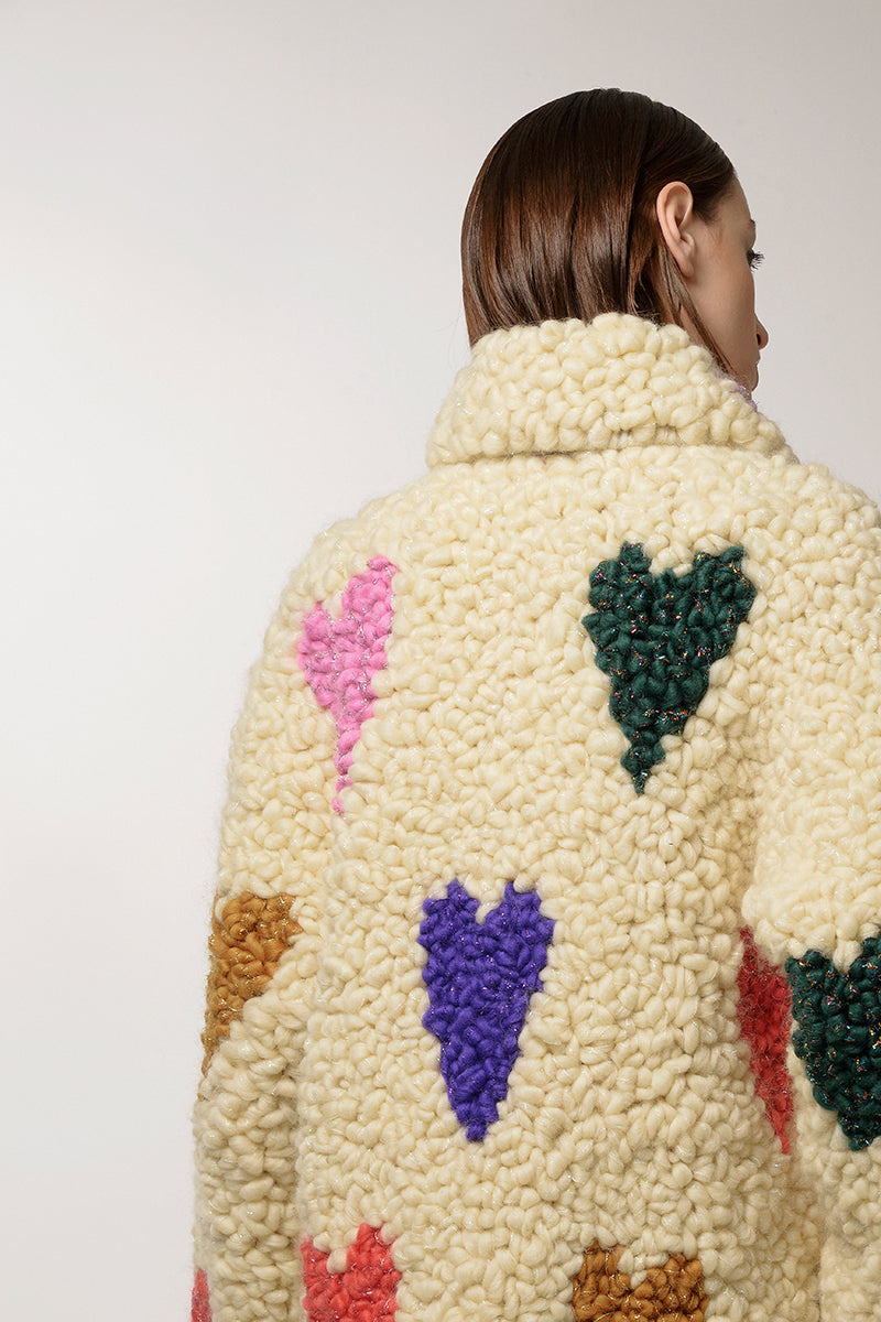 Lalo Cream Hearts Wool Coat with a tailored fit, featuring a soft wool fabric and heart-patterned design on a neutral background.