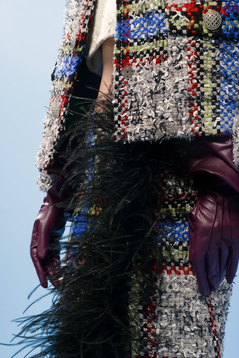 Beige and blue checked wool and feather midi skirt by Lalo, featuring a stylish, patterned design with a flowy silhouette.