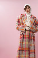 Lalo Mandarin Muse wool coat displayed on a hanger, showcasing its tailored fit and classic design in neutral tones.
