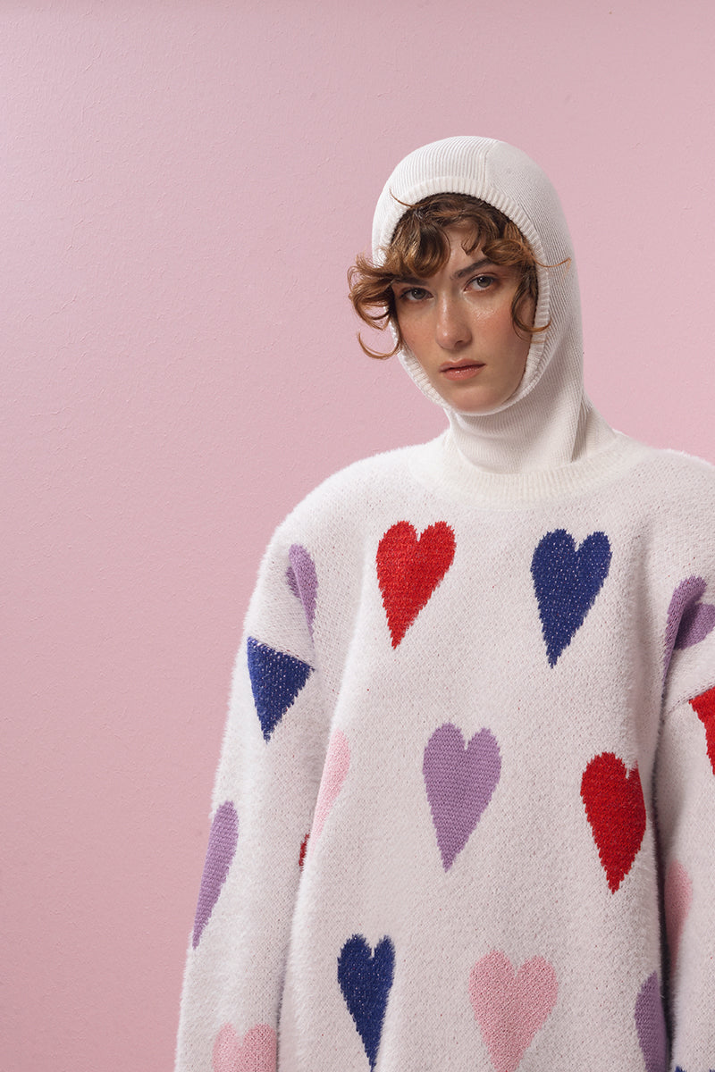 Lalo white hearts wool sweater featuring a cozy knit design and a classic crew neckline, perfect for casual wear.